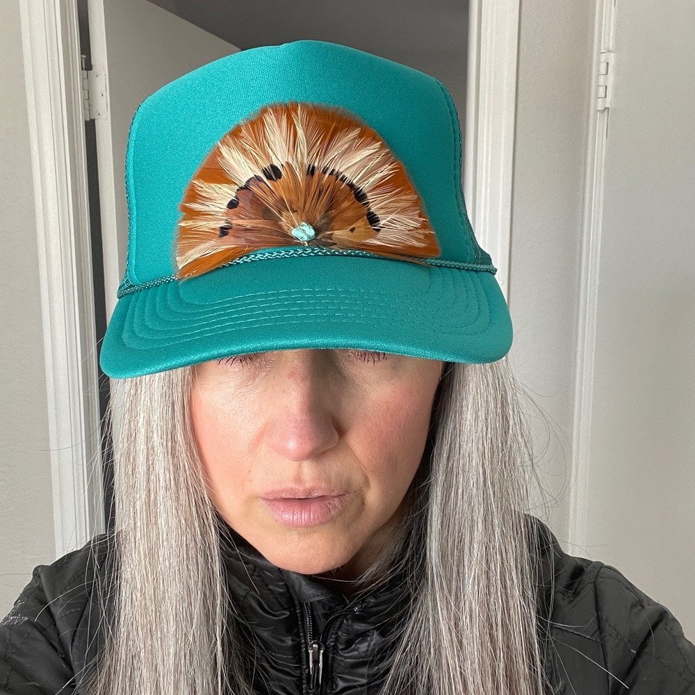 Trucker hat with feathers